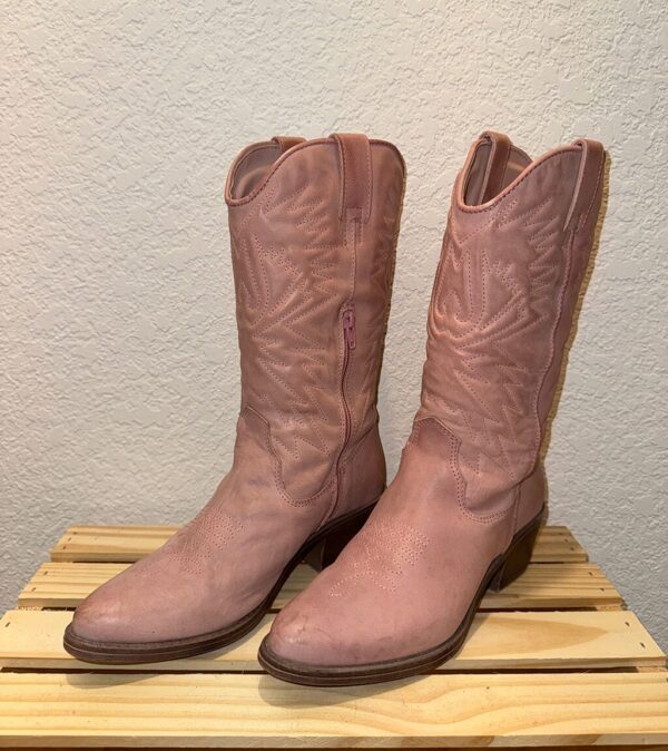 Side angle shot of baby pink boots